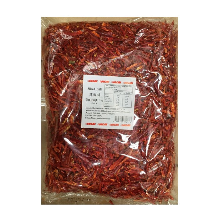 A clear plastic bag filled with sliced red chili peppers, with a white product label in the center, photographed against a plain white background.