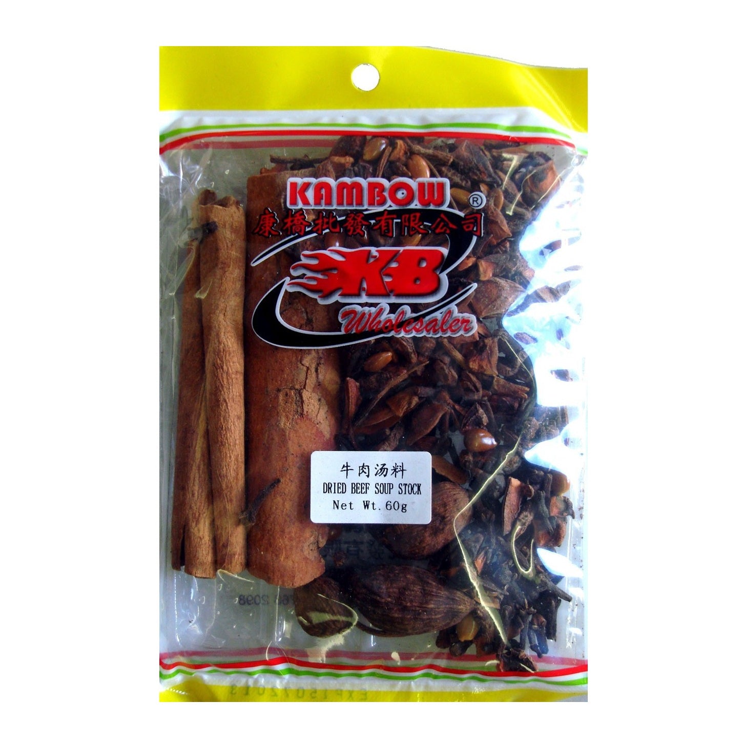 A clear plastic bag of Kambow beef stock seasoning mix, containing cinnamon sticks, star anise, and other spices, with a yellow and red header.