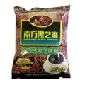 A single bag of Nanfang Black Sesame instant coffee powder, featuring a dark green and gold label with Chinese and English text, set against a plain white background.