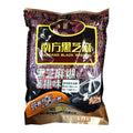 A 300g bag of Naneang Black Sesame (Southern Black Sesame) in a dark brown and black packaging with gold accents, featuring Chinese and English text and a graphic of black sesame paste.