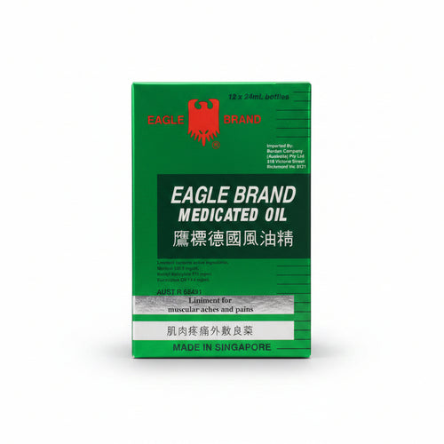 A green box of Eagle Brand Medicated Oil, 12 x 24ml bottles, with a red eagle logo and white text, photographed against a light background with a red '12x24ml' text overlay at the top.