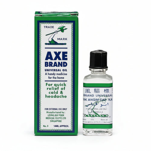 A box and a small bottle of Axe Brand Universal Oil handy medicine for the home, shown on a plain white background.