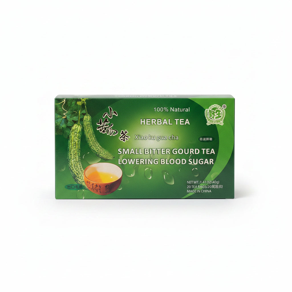 A green box of Xiao Ku Gua Cha herbal tea featuring illustrations of small bitter gourds, a bowl of yellow tea, and text including '100% Natural' and 'Lowering Blood Sugar'.