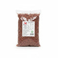 A 1kg bag of Kam Bow Group Dried Sichuan Pepper, showing the red dried peppercorns inside a clear plastic bag with a white product label.