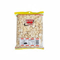 A clear plastic bag of Kam Bow Group Apricot Kernel snack pieces, showing the light beige kernels inside, with a white product label at the bottom left.